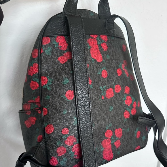 Michael Kors Black Backpack with Red Floral Pattern